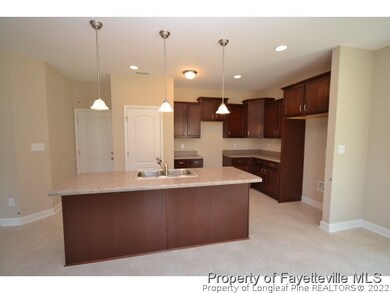 Kitchen w/Island & Pantry