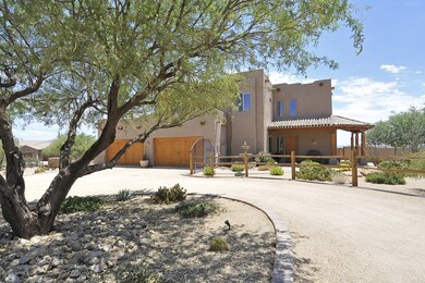 Front of home showing 4 car garage