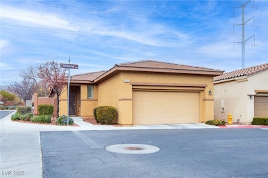 View of front of house featuring stucco siding, a