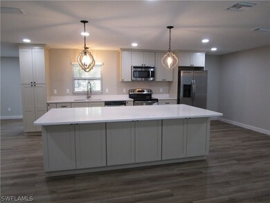 Kitchen w/wine cooler & Xtra cabinets on Front of