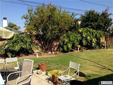 View of back yard and patio area