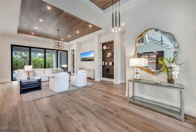 Living Room/Foyer.  Custom Wood flooring throughou