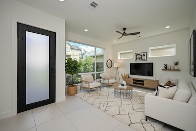 Walk into a flex space for an additional living room, Gameroom or office. Large Size Tile Floor. 10' Ceiling. Virtually Staged.