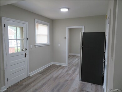 Doorway to outside featuring light hardwood / wood