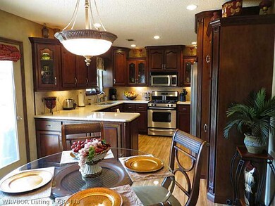 Dining Room. DINING AREA LOOKING INTO KITCHEN