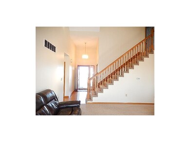 Looking from the living room towards the front ent