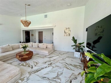 Living room featuring a textured ceiling and a not