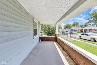 covered porch with a residential view