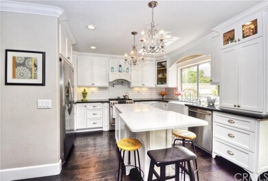 Kitchen has soft close drawers, custom lighting, l