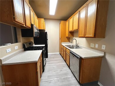 Kitchen with appliances with stainless steel finis