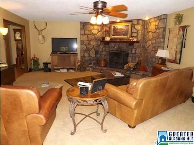 This living room is just off of the kitchen and ha