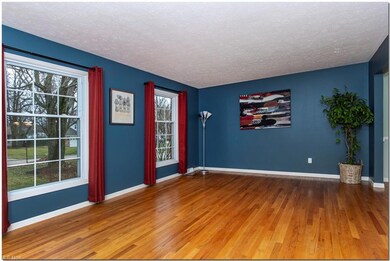 Beautiful hardwood floors in the spacious living room and the large formal dining with chair rail moldings