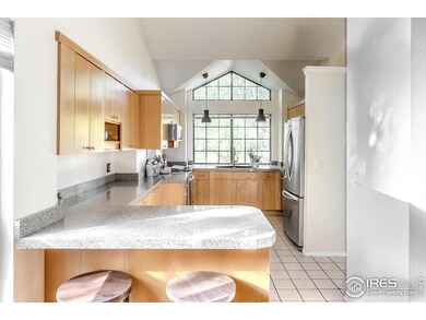 Kitchen with stainless appliances and granite counters