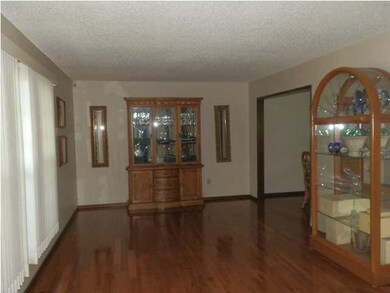 Formal living room with hardwood floors