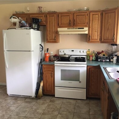 Oak Kitchen in occupied side, Stove and refrigerat