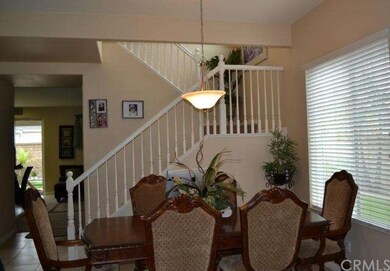 Entry way with Living Room and formal dining area