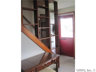 Living Room. The front door opens into a small ent
