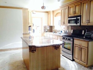Custom kitchen with decorative cabinets , granite 