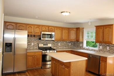 Renovated kitchen with backsplash and stainless-st