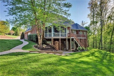 View of the rear showing that this home with a full walk-out basement has brick on four sides!