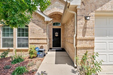 View of exterior entry featuring a stone work fini