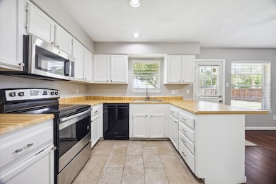 Beautifully updated kitchen with a window by sink