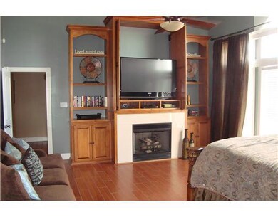 Master Bedroom. Gas fireplace and cusstom built-in