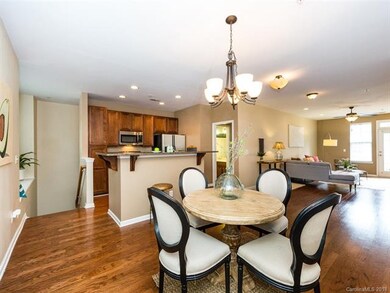 Open rooms and warm wood floors await you when you