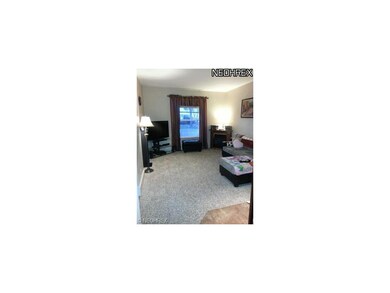 Terrific den off the amazing kitchen. New carpet