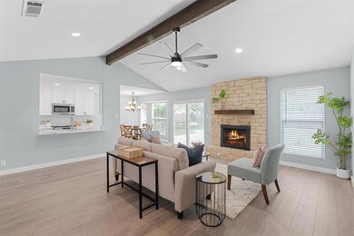 Living area featuring light wood-type flooring, c