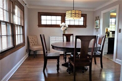 Dining room with hardwoods, wonderful windows, upd