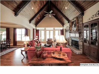 The beautiful hand laid pine ceiling is a focal po