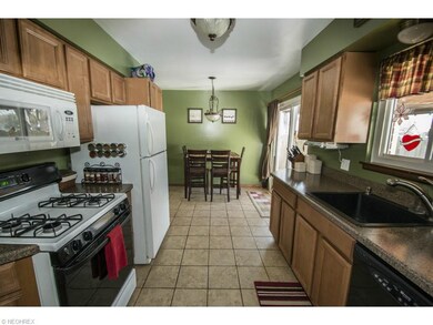 The kitchen features a wonderful deep farmhouse si
