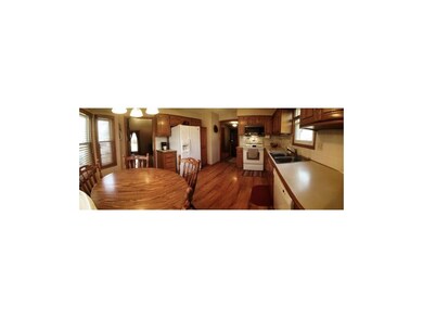 Eat-in kitchen with bay window.