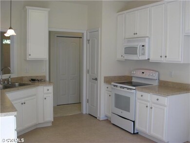 Kitchen - PHoto is of previously built home.  Phot