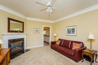 Family Room features Gas Fireplace and Ceiling Fan