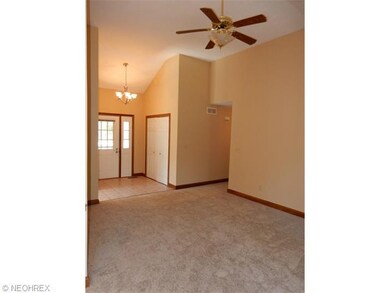 Family room with gas fireplace and new carpet and 