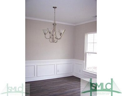 Dining Room. Dining has crown moulding, chair rail