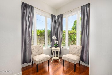 LIVING ROOM WITH LARGE PICTURE WINDOWS