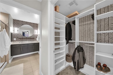 Primary ensuite and walk-in custom closet