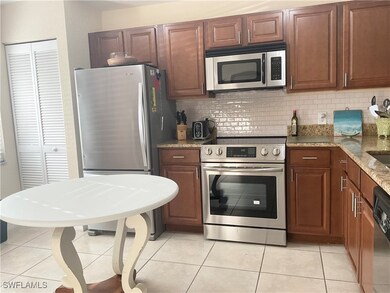 Kitchen featuring stainless steel appliances, gran