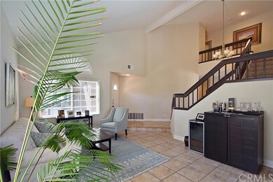 Looking from the formal dining area to the front d