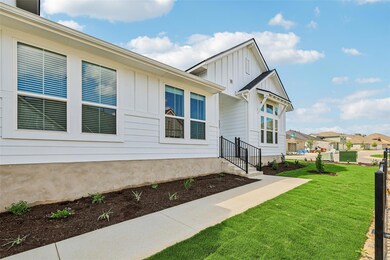 View of home's exterior featuring board and batte