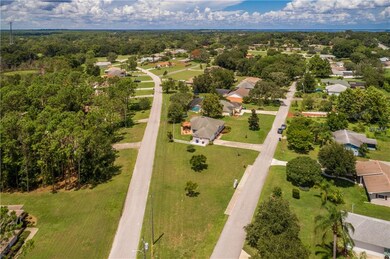View of entire property with Lake Harrison wrappin