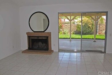 Spacious living room with sliding door access to a