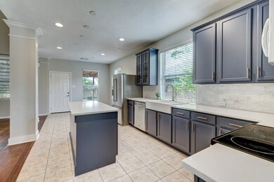 Kitchen with new countertops, sink, and faucet