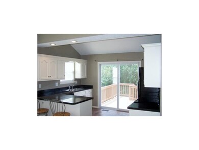 KITCHEN OFFERS ALL APPLIANCES & OPENS UP TO DECK!