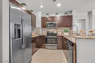 Kitchen featuring stainless steel appliances, tast