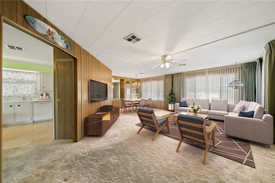Spacious living/dining room- virtually staged to show potential layout