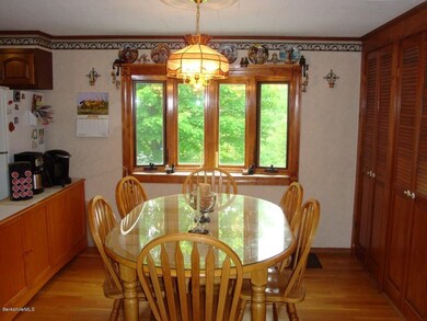 Dining room off kitchen with views!